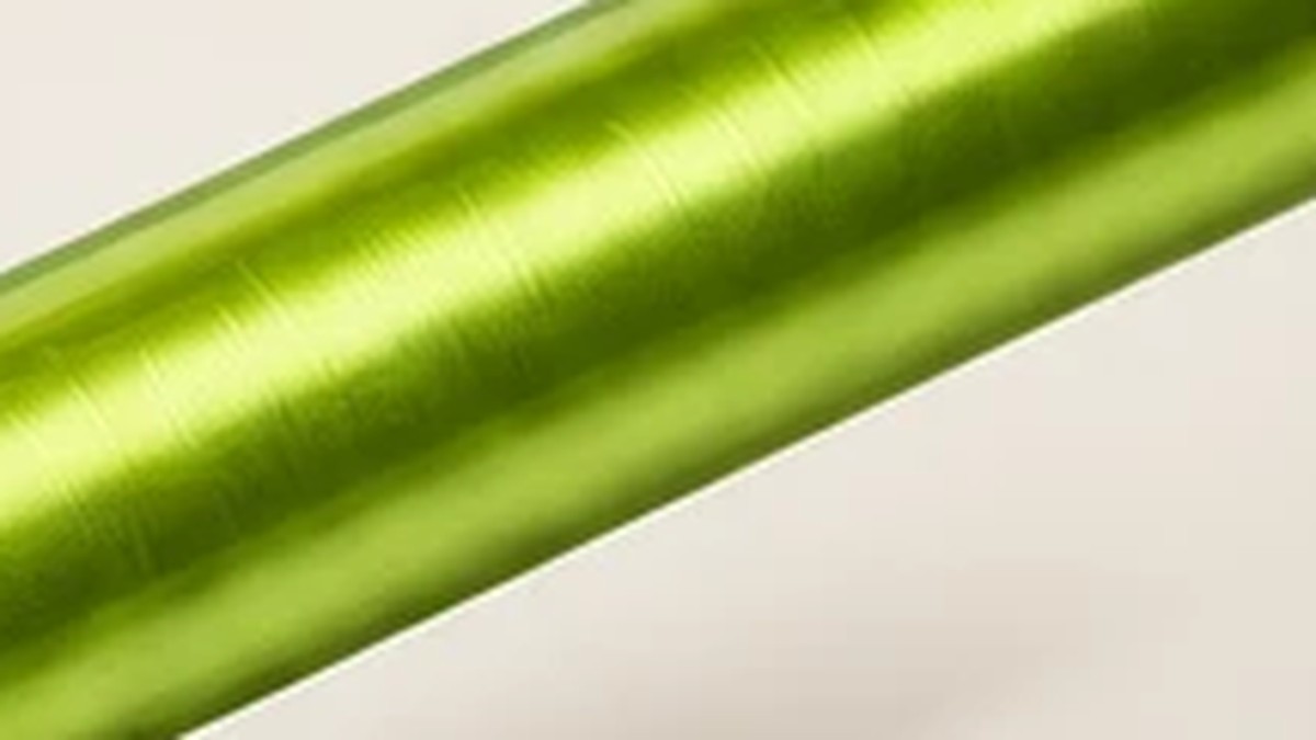 Close-up of the lime green metal shaft